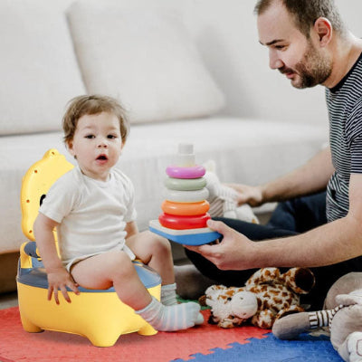 pot-bebe-canard-jaune-papa avec bebe sur pot