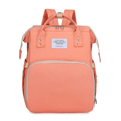 sac à langer rose - lit bébé de voyage